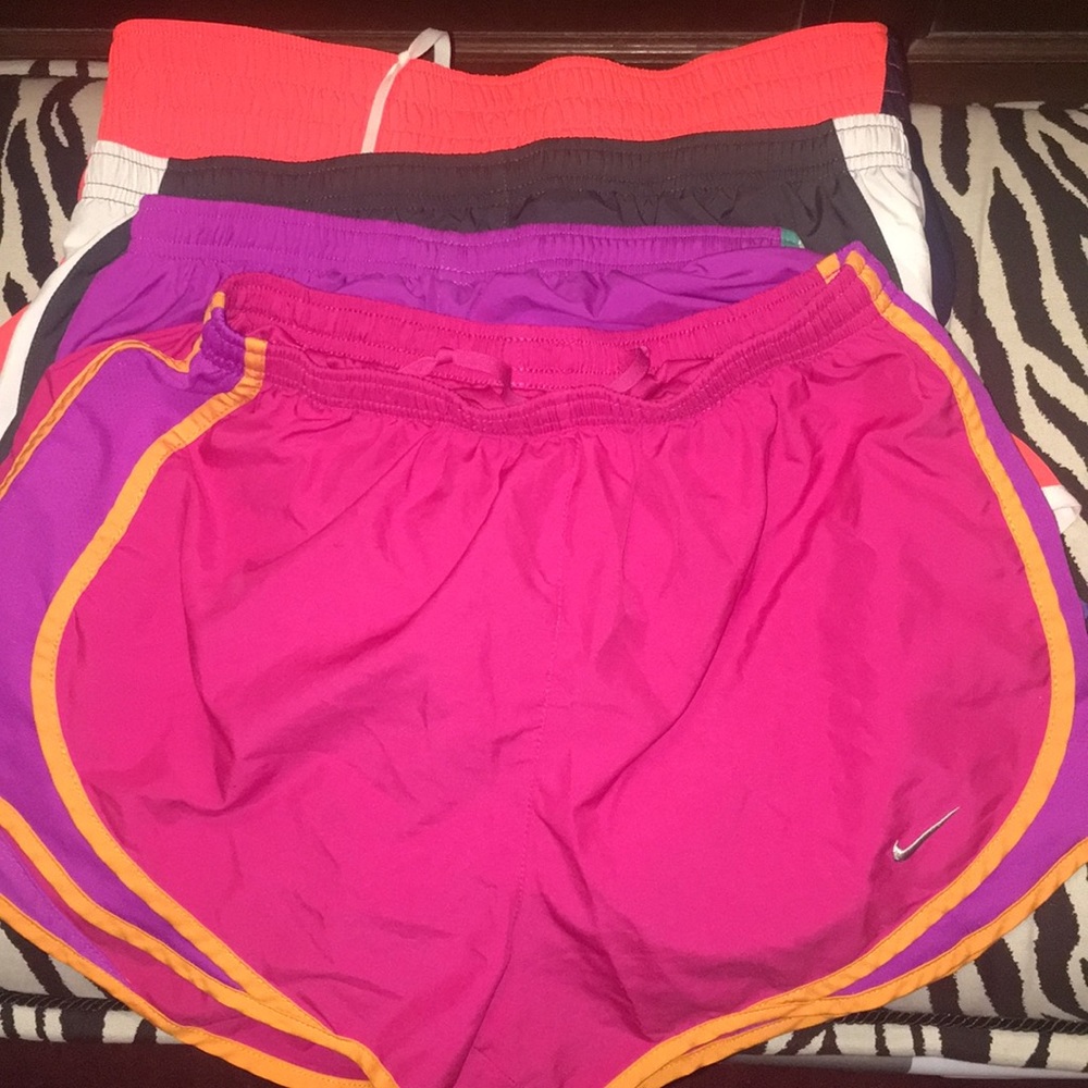 4 Nike Dri-Fit shorts.